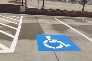 Blue Handicap Symbol In Parking Lot - Huntington, WV